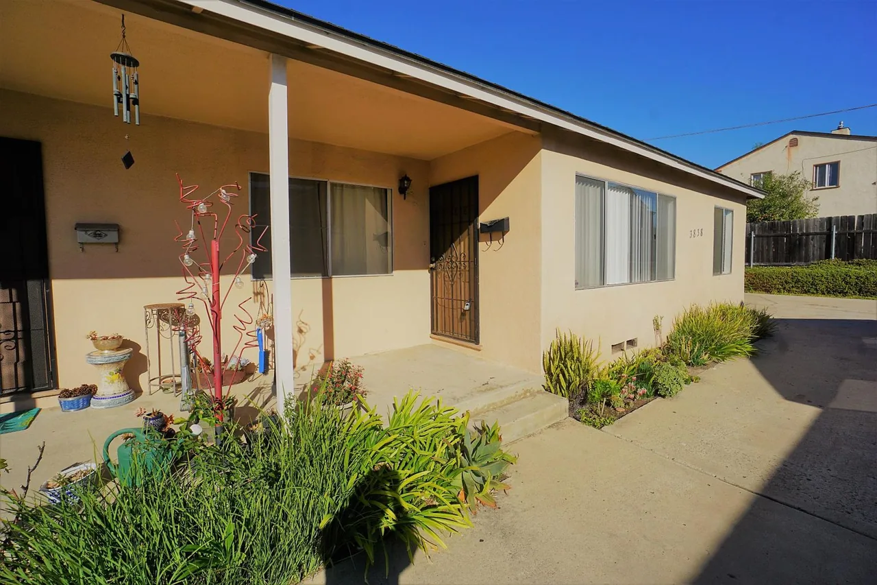 Front exterior and covered porch at 3828–30 Udall St, Ocean Beach