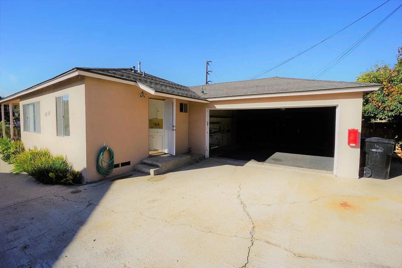 Two-car garage and rear of the property